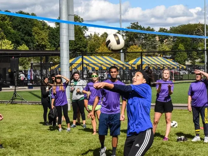 People playing soccer on Mitchell Field