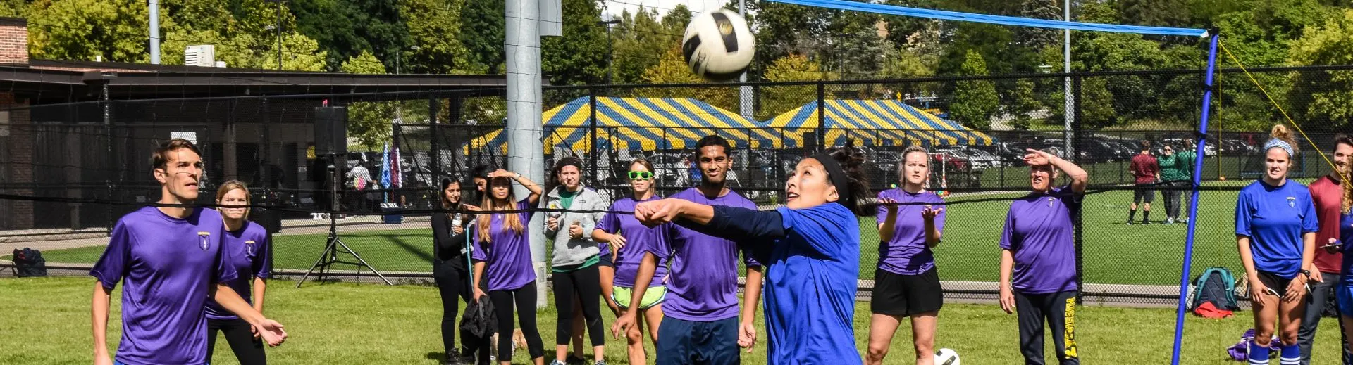 People playing soccer on Mitchell Field