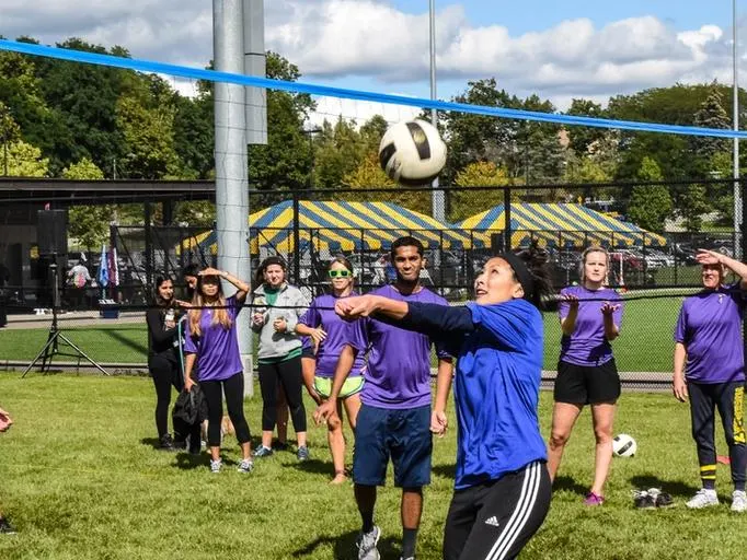 People playing soccer on Mitchell Field